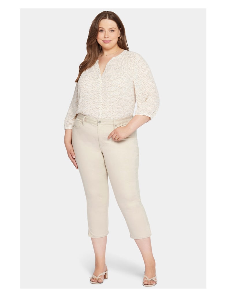 Front of a model wearing a size 14W Chloe Capri Pants in Feather by NYDJ. | dia_product_style_image_id:296922
